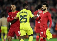 Liverpool's Egyptian midfielder Mohamed Salah and Villarreal's Ivorian defender Serge Aurier congratulate each other at the end of the UEFA Champions League semi-final first leg football match between Liverpool and Villarreal, at the Anfield Stadium, in Liverpool.