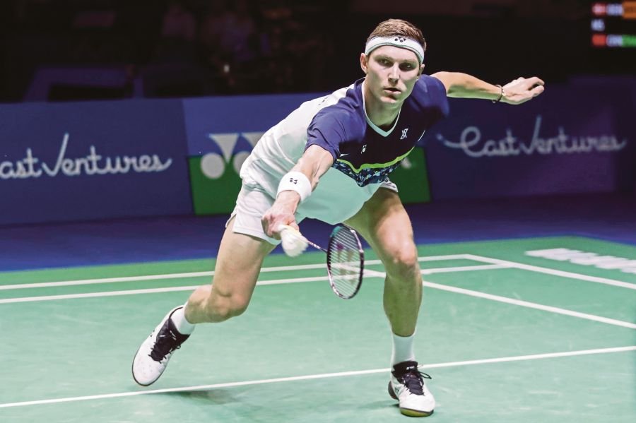 Viktor Axelsen playing against Zhao Jun Peng in the Indonesia Open final on Sunday.